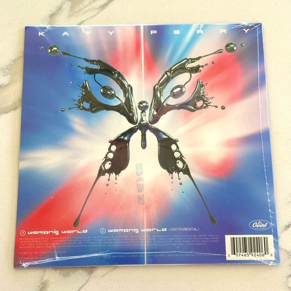 NEW SEALED Katy Perry 7” Woman’s World Translucent Orange 7” 45 RPM Single - Picture 4 of 8